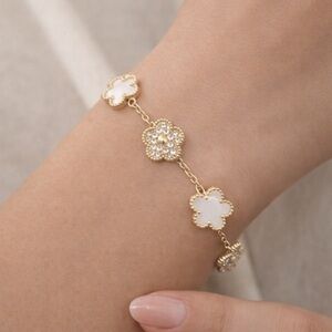Elegant Gold and White Flower Bracelet